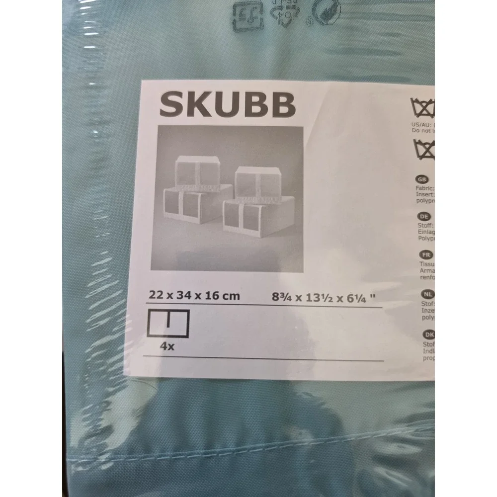 Brand new sealed IKEA SKUBB storage boxes, set of 4. Light teal/mint green color